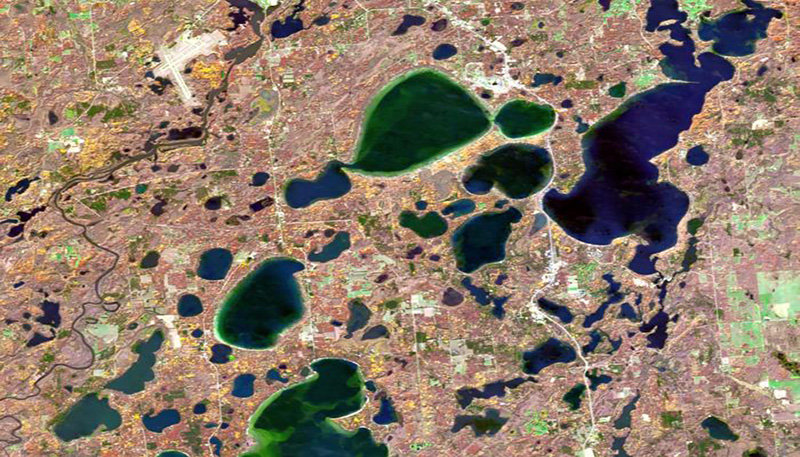 Satellite image of lakes with varying amounts of chlorophyll.